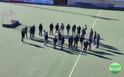 Demonstration of machinery for cleaning artificial turf on hockey fields